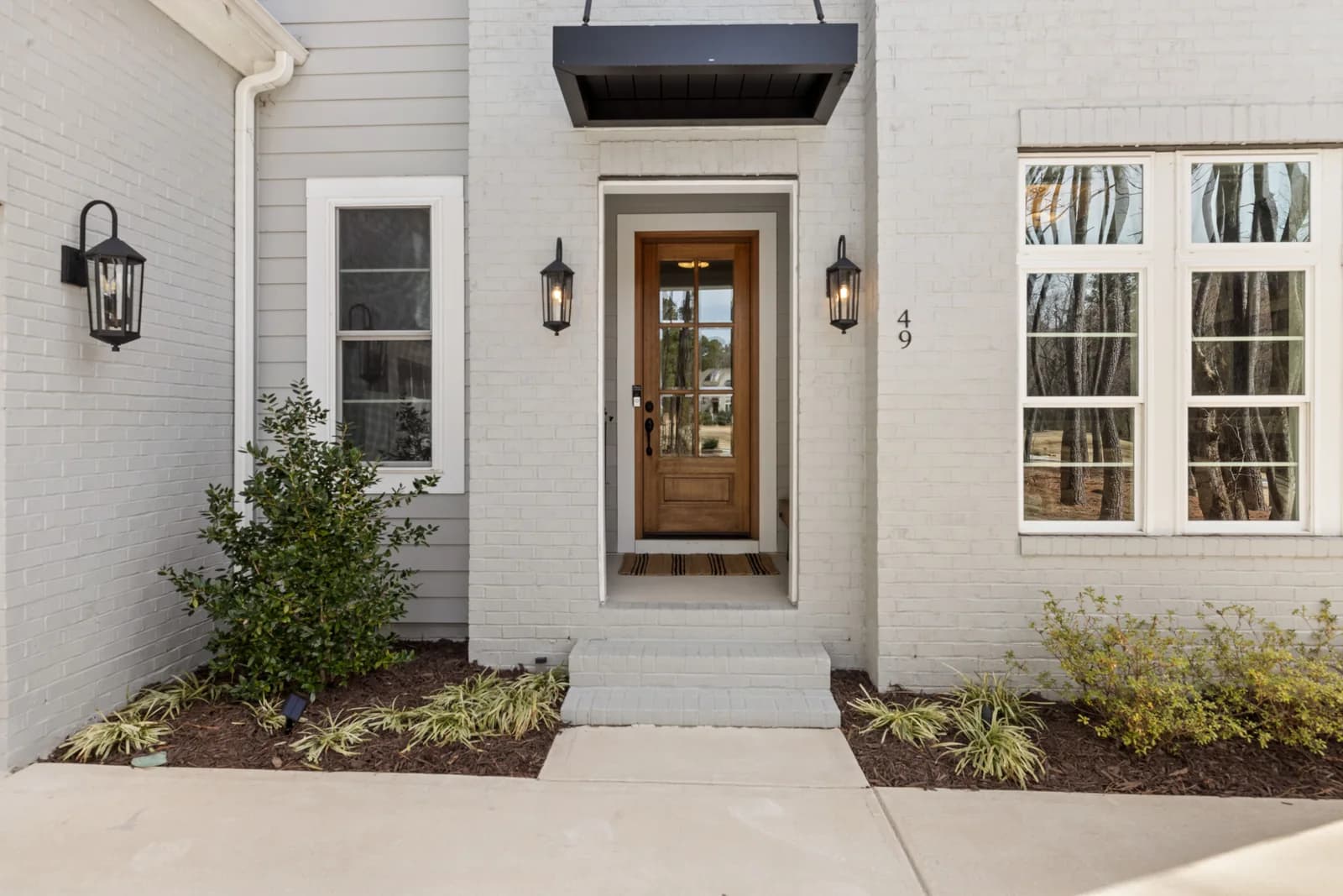 Architectural inspiration: wood entry door and glazed sidelights